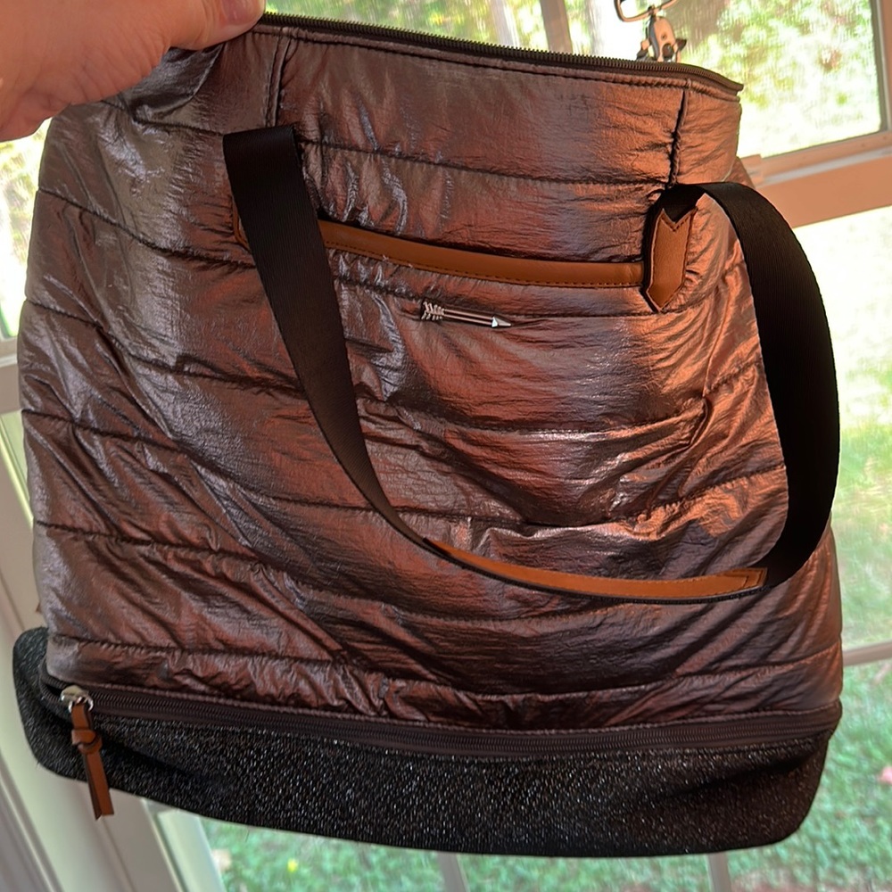 Travel Bag with a bottom pocket